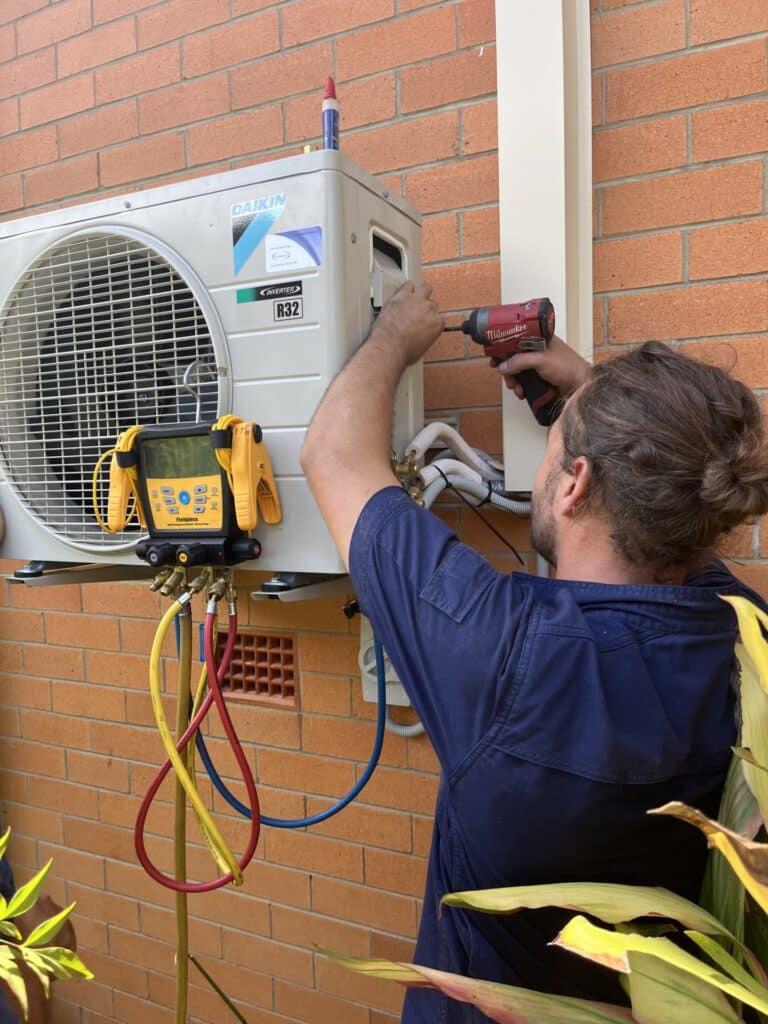 Nick working on an outdoor unit